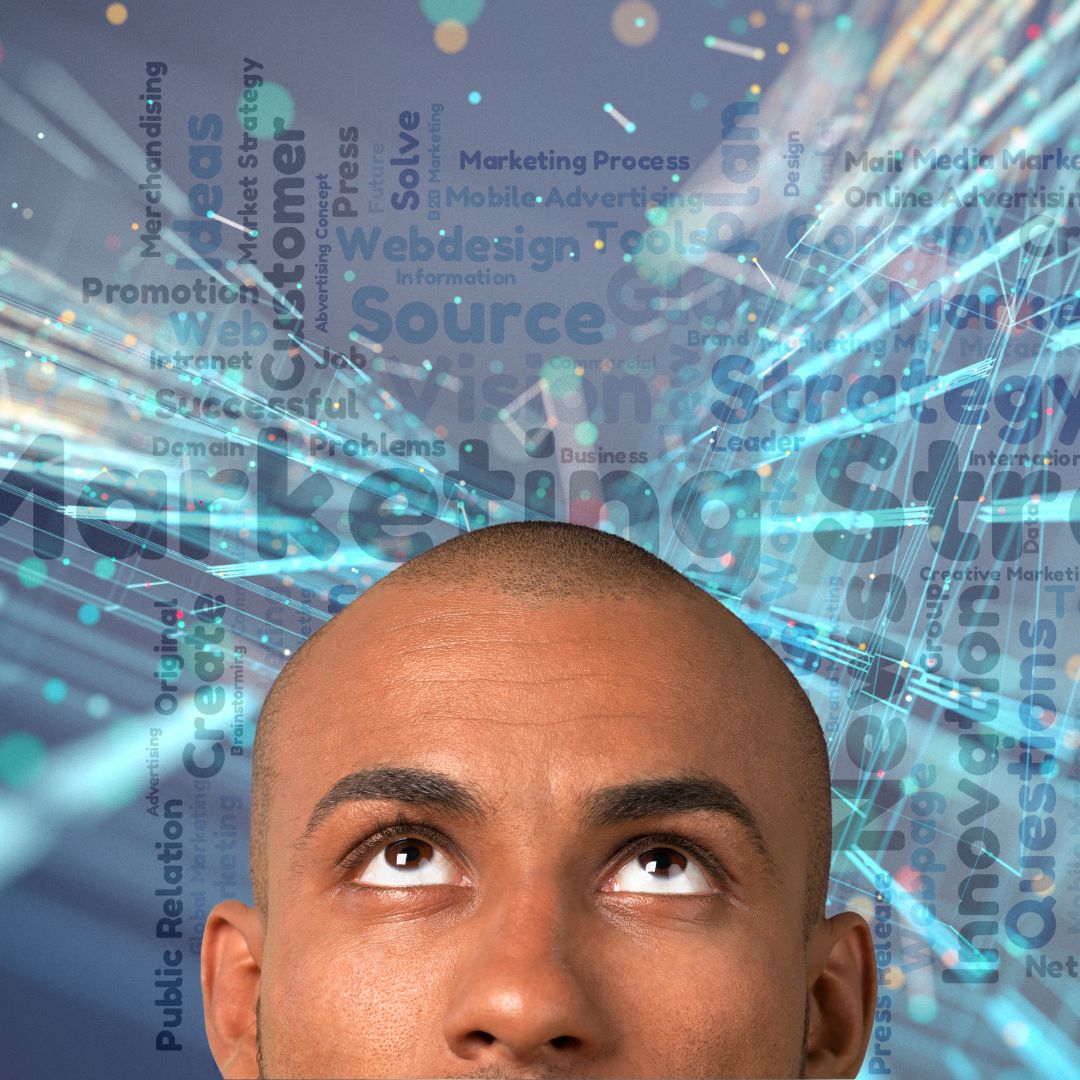 A graphic showing a digital marketing word cloud behind the upper half of a man's head.